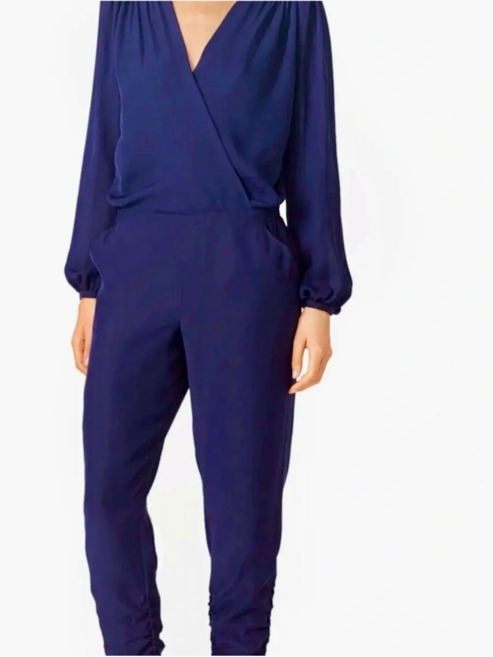Parker Navy blue jumpsuit with open back and long sleeves, size M. Brand new